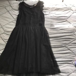 Francesca’s black dress